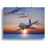 Jet liner over the sea at dusk Canvas Print or Poster